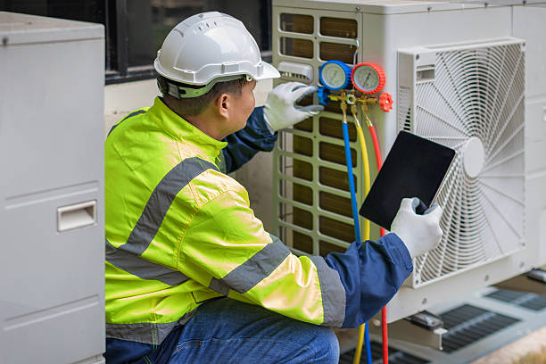 Professional Heat Pump Repair technician working in Yaphank, NY